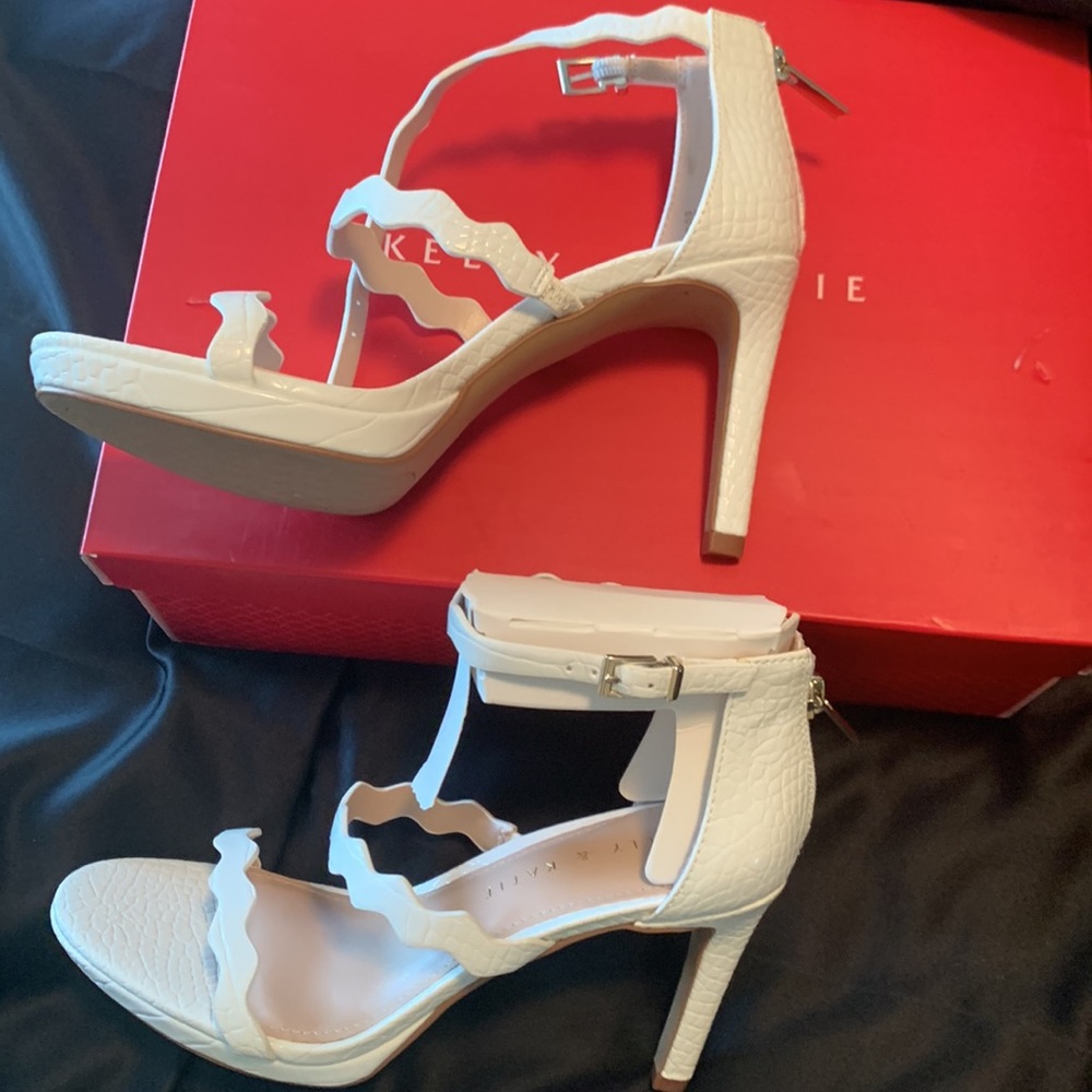 Ankle strap white (slight) platform high heeled shoes. Dress up or down. Classy